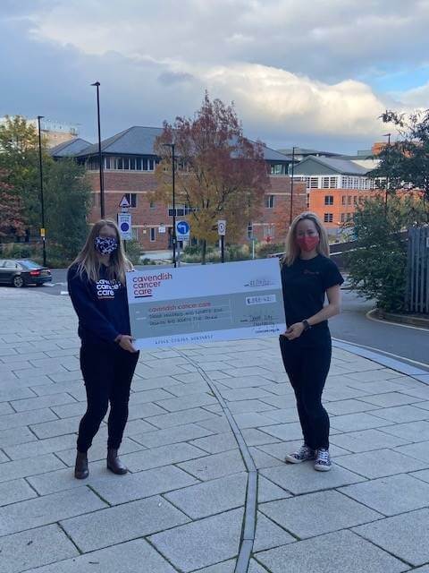 Kirsty White Corporate Partnerships Officer of Cavendish Cancer Care, with a cheque from Jennifer Burton, Steel City Marketing Marketing Executive.