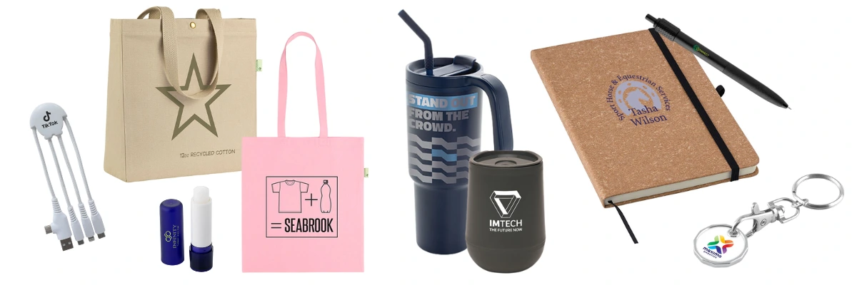 Flat lay of branded event merchandise including pens, notebook and tote bag.