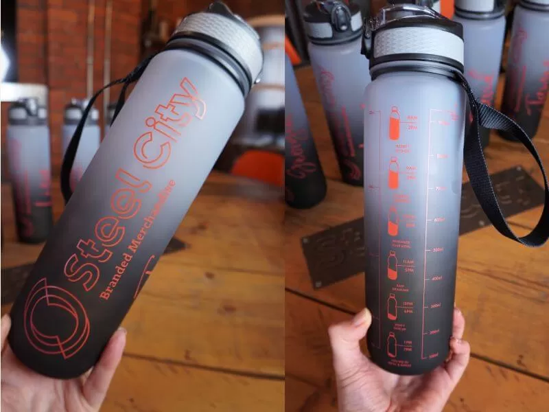 Branded sports bottle with daily hydration scale